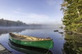 Green Canoe Tied to Dock Royalty Free Stock Photo