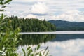 Green cape on lake. Tagasuk lake