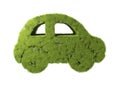 Green car with grass growing on it Royalty Free Stock Photo