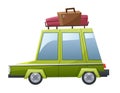 Green car with suitcase and tourist luggage on roof, funny vehicle