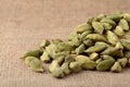 Green Cardamom pods on sack cloth Royalty Free Stock Photo