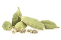 Green cardamom pods and seeds isolated on white background. Dried cardamom spice Royalty Free Stock Photo