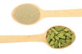 Green cardamom seeds and powder in a wooden spoon isolated on white background. Top view. lay flat Royalty Free Stock Photo