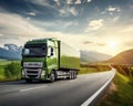 green cargo truck is traveling on the highway during the daytime.