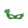 Green carnival festival mask with green violet feather