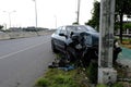 Green cars drive with negligence quickly. And collided with the electric pole until it was damaged,Car accident and waiting to be Royalty Free Stock Photo