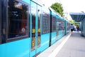 green cars U2 Bonames underground train on rails, Frankfurt metro train, typical German Public Transport Stadtbahn travels