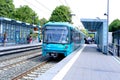 green cars U2 Bonames underground train on rails, Frankfurt metro train, typical German Public Transport Stadtbahn travels