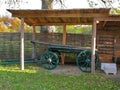The green cart under wooden canopy Royalty Free Stock Photo