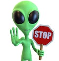 Green Cartoon Alien Holding Stop Sign Royalty Free Stock Photo