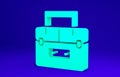 Green Case or box container for wobbler and gear fishing equipment icon isolated on blue background. Fishing tackle Royalty Free Stock Photo