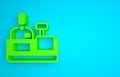 Green Cashier at cash register supermarket icon isolated on blue background. Shop assistant, cashier standing at