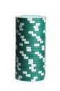 Green casino chips stacked on white background. Poker game Royalty Free Stock Photo