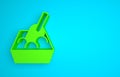 Green Cat litter tray with shovel icon isolated on blue background. Sandbox cat with shovel. Minimalism concept. 3D