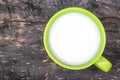 Green ceramic cup with organic milk
