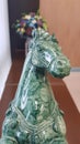 Green ceramic horse