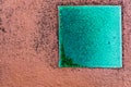 Green ceramic tile on concrete Royalty Free Stock Photo