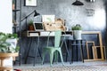 Green chair in designer`s room Royalty Free Stock Photo