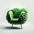 A green chair with a feathered wing design on it.