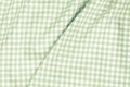 Green checkered fabric tablecloth Royalty Free Stock Photo