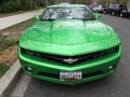 Green Chevrolet Camaro Parked on a Quiet Street