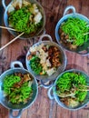 green chicken noodles with small wok plate Royalty Free Stock Photo