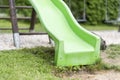 Green child slide on playground