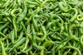 Green chili pepper heap close-up