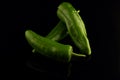 Green chili peppers on black background. Close up Royalty Free Stock Photo