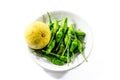 Green chili and yellow lime lamon on the white background