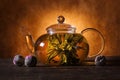 Green Chinese tea flower bud blooming in glass teapot Royalty Free Stock Photo