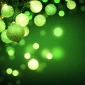 Green Chrismas balls in light bokeh blurred background. Christmas blue decorations Royalty Free Stock Photo