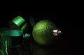 Green Christmas bulb and ribbon Royalty Free Stock Photo