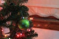 A Green Christmas Bulb shot closeup on a on a Christmas Tree Royalty Free Stock Photo