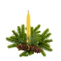 Green Christmas Fir Tree Branch with Cones and Candle isolated on White like Christmas Decor Royalty Free Stock Photo