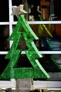 Green Christmas Tree With Silver Star Window Display