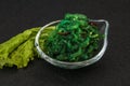 Green Chuka Seaweed Salad Isolated on White Background Top View. Wakame Sea Kelp Salat