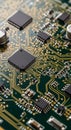 Green circuit board with integrated circuits and microchips connected by intricate Royalty Free Stock Photo