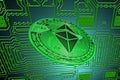 green circuit board and a valueable green ether coin from ethereum crypto currency oblique
