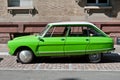 Green Citroen Ami 8 parked in the street