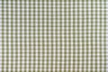 Green classic checkered tablecloth texture, background with copy space. Royalty Free Stock Photo