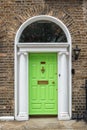 Green classic door in Dublin, example of georgian typical architecture of Dublin Ireland