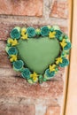 Green clay heart, traditional Mexican crafts