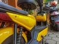 Green and Clean: An Electric Bicycle Parked on the Paved Yard