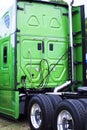 Green clean new model rig semi truck rig back view Royalty Free Stock Photo