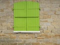 Green closed wood shutters