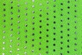 Green cloth with plastic circles Royalty Free Stock Photo
