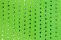 Green cloth with plastic circles Royalty Free Stock Photo