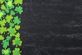 Green Clover on Chalkboard Background