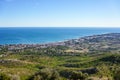 Green coast in the Mediterranean Sea on a sunny day Royalty Free Stock Photo